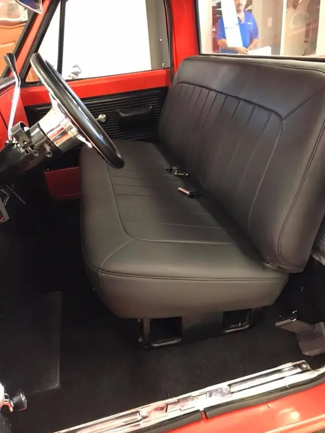 A classic pickup bench seat in black vinyl.