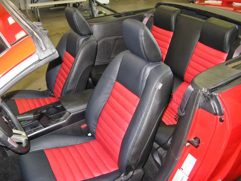Mustang GT convertible interior in black leather with red inserts