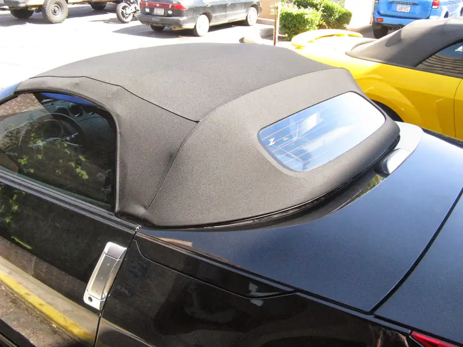 New black convertible soft top installed on a Nissan 350Z